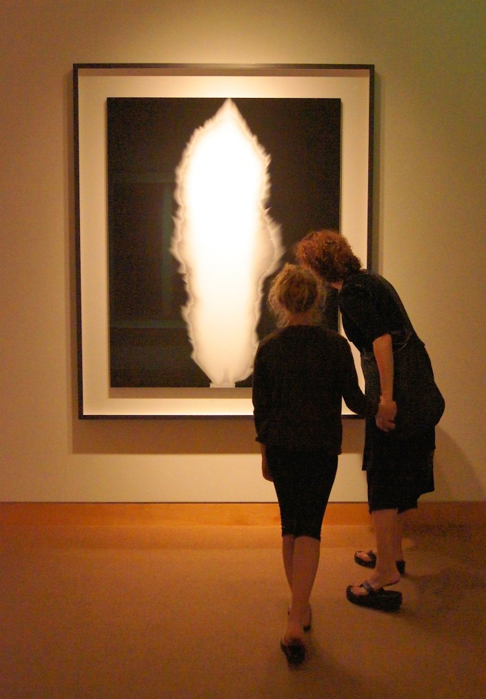 Sadie and Deb looking at Hiroshi Sugimoto's In Praise of Shadows. Photo courtesy of Richard Nagler. 